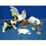 A quantity of animal and bird ornaments including Spaniel (repaired),
