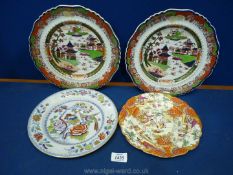 Four plates in oriental designs including;