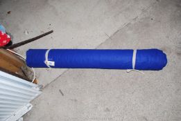 A roll of blue baize, two yards wide and five metres long, approx.