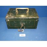 An Edwardian tin cash box with alarm, keys present, 8 1/2" long x 6" wide x 4" deep.