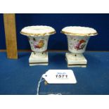 A pair of Regency English porcelain miniature Jardinieres each with drainage system for planting;