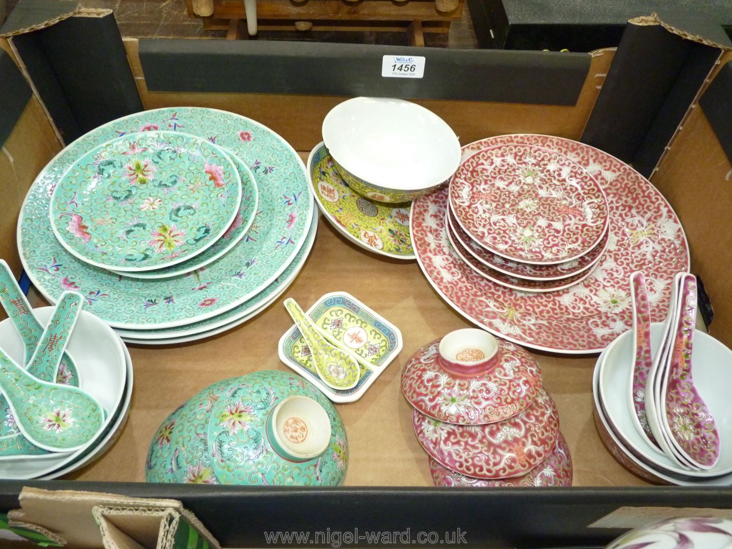 A quantity of oriental dinnerware including plates, rice bowls and covers/stands, spoons etc,