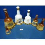 A quantity of Bells Whiskey bells of varying size including two white and four brown,