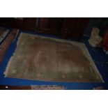 A large Chinese bordered and fringed Rug, beige ground,