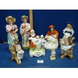 A group of late 19th/early 20th century figurines; Red Riding Hood, Yardley's Lavender etc.