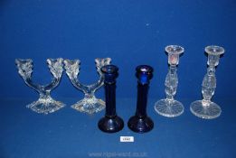 Three pairs of candlesticks, blue glass,