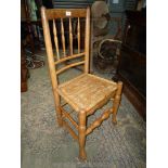A Clissett type side Kitchen Chair in Oak and Ash with turned front stretcher and four spindle