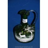 A Mary Gregory green glass jug, 8" tall.