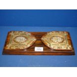 A Victorian Rosewood and brass book sliding rack.