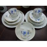 A Cornflower part Teaset including three cups, five saucers, six tea plates, two cake plates,