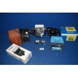 A Halina 500 35mm Camera with instructions and ever ready case,