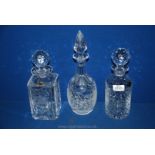 Three Royal Brierley Fuchsia cut glass decanters (small chip to tip of stopper).