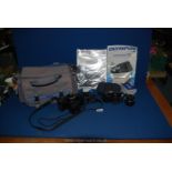 An Olympus 35mm Camera Outfit including an Olympus OM 101 Power Focus 35mm SLR Camera with an
