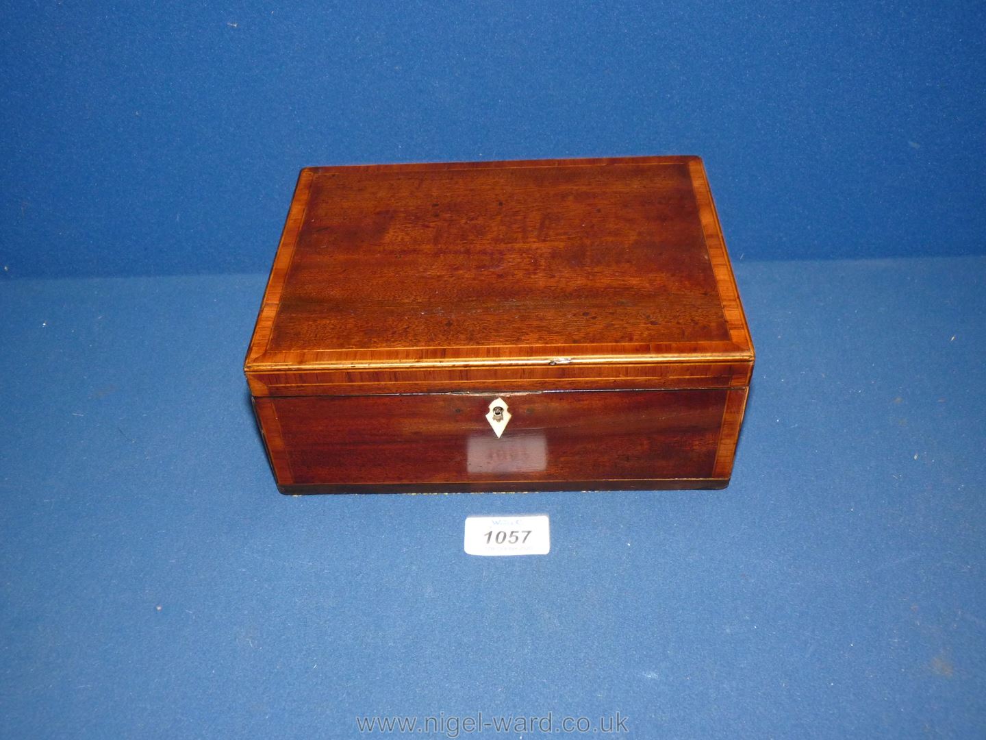 A Mahogany inlaid jewellery Box c. 1910, key present, 8 1/4" long x 6" wide x 3" deep.