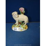 A small Staffordshire spill Vase in form of sheep leaning on a trunk (slight chip to rim).