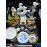 A quantity of china ornaments including a pair of rearing horses, small mantle spaniel,