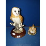 A Border Fine Arts figure of Owlets and Barn Owl, with base. 14" tall.