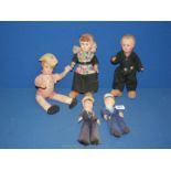 Five old dolls including sailors and Dutch girl, all approx. 11'' tall.