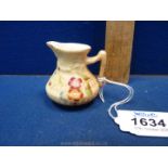 A miniature Royal Worcester Jug, G1057, date code for 1907,