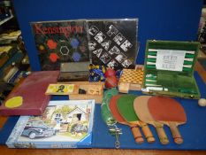 A boxed green covered Backgammon game, a new 500 piece jigsaw, Scrabble, a small wooden Chess set,