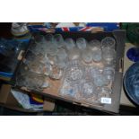 A quantity of glass to include Ravenhead bark effect glasses, a part dressing table set,