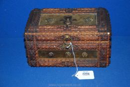 A Tramp Art Jewellery box, 10'' long x 6 1/2'' wide x 6'' tall, with key.