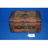 A Tramp Art Jewellery box, 10'' long x 6 1/2'' wide x 6'' tall, with key.