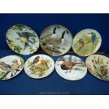 Seven British bird plates.