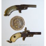 Two very uncommon and highly collectable antique miniature duelling pistols with movable parts