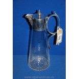 A Claret jug with silver plate top, handle and Bacchus faced lip.