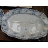 A turkey plate with grey floral and scrolling foliage design to the rim,