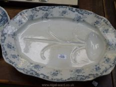 A turkey plate with grey floral and scrolling foliage design to the rim,