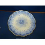 A large Copeland Charger with petal shaped rim and in blue and white, Moorish decoration,