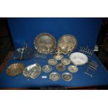 Miscellaneous silver plated items including three toast racks, dishes, candelabra etc.