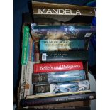 A box of books including Mandella, White Mughas, British and Irish History, etc.