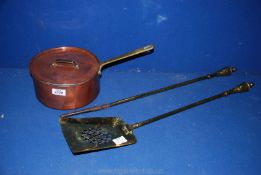 A quantity of brass to include fire irons and a copper pan.
