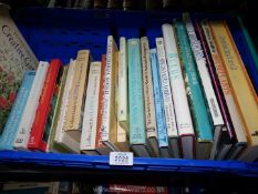 A crate of gardening books