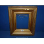 A deeply recessed antique gilt picture Frame,