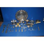 A box of plated items to include a round tray, serving fork and slice, crumb tray, forks and spoons,