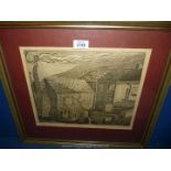 A framed Woodcut Print depicting houses with rolling hills in background 19'' x 17 1/2''