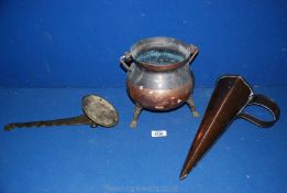 A copper ale muller, a copper pot and a brass pot bracket for a range cooker.