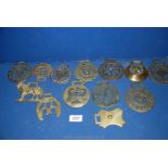 A quantity of mainly old horse brasses including hearts, acorn, etc.