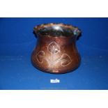 A copper jardiniere with fluted rim and engraved leaf decoration, marked Made in London,