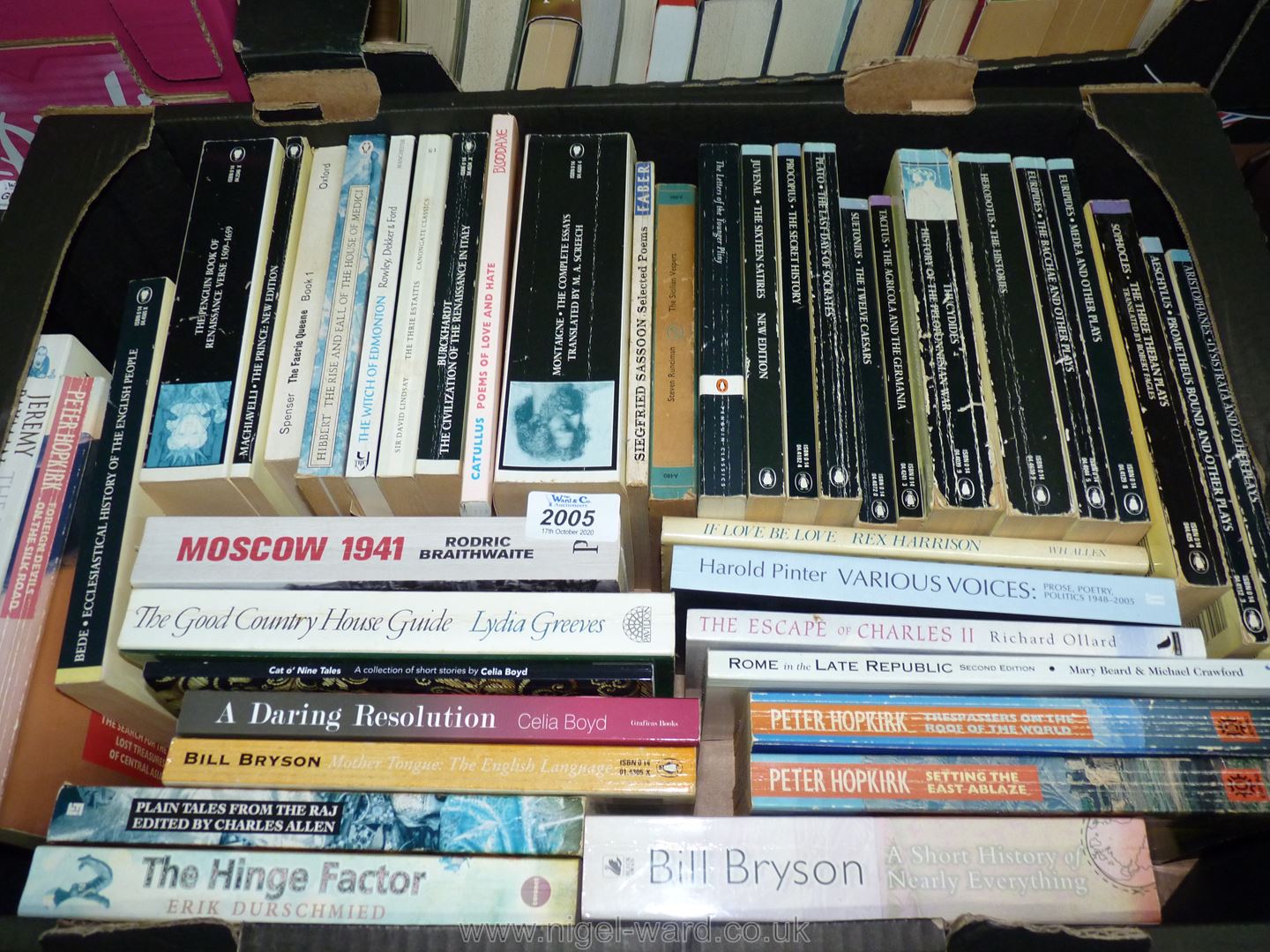 Two boxes of soft back Novels including Peter Hopkirk, Jeremy Paxman, Dick Francis, etc.