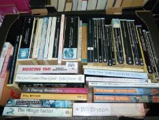 Two boxes of soft back Novels including Peter Hopkirk, Jeremy Paxman, Dick Francis, etc.