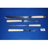 A three piece carving set and one large carving knife all with bone handles.