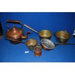 A quantity of brass and copper including three saucepans, small jam pan,