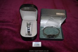 A Gents Seiko wristwatch and Ladies Emporio Armani wristwatch, both boxed.