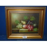 A gilt framed still life of fruit Oil on canvas, signed lower right M. Aaron, 13 1/2" x 11 1/2".