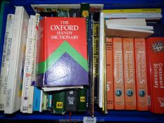 A crate of books including Illustrated Guide to Britain, Mensa Mind assault Course,